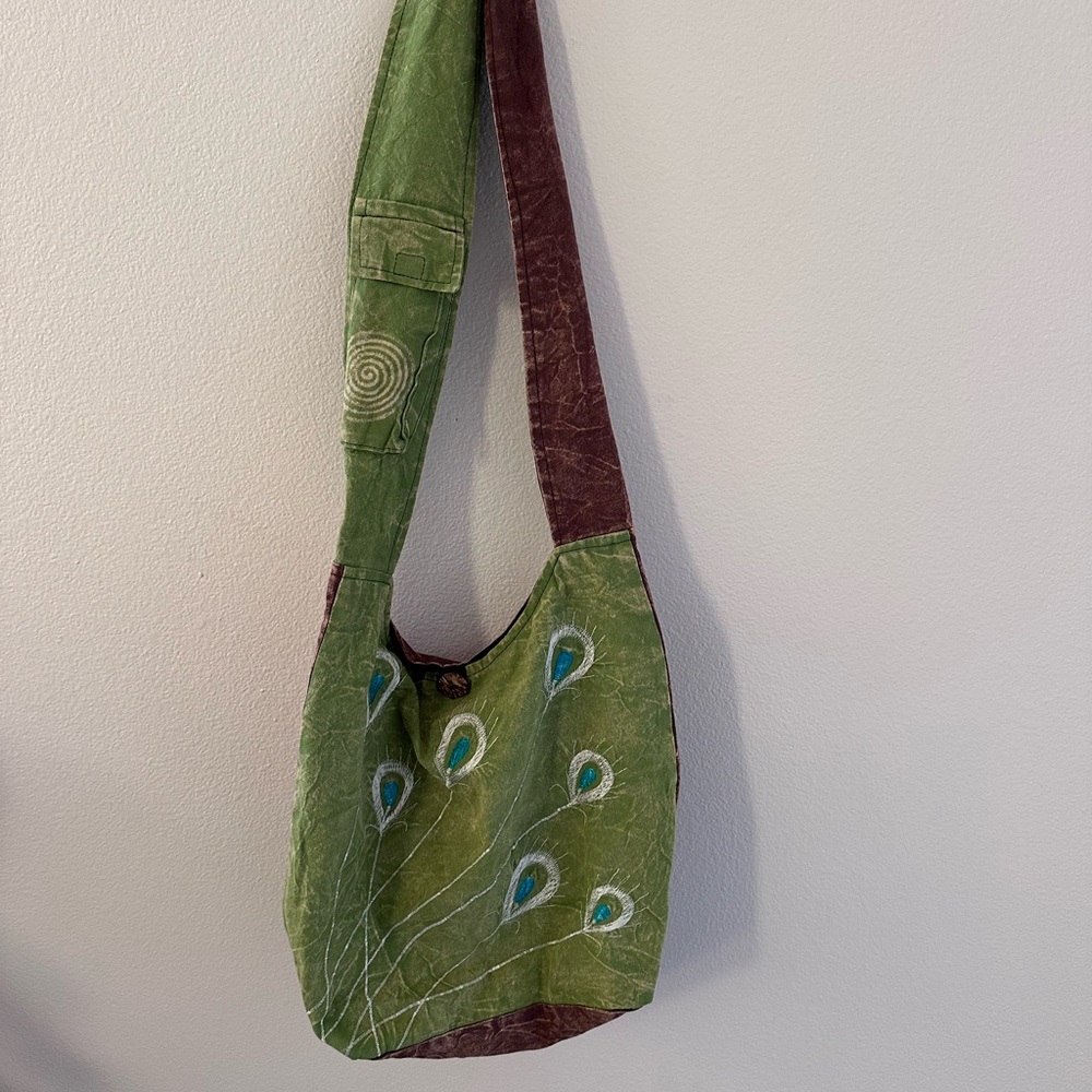 Embroidered peacock feather boho bag
